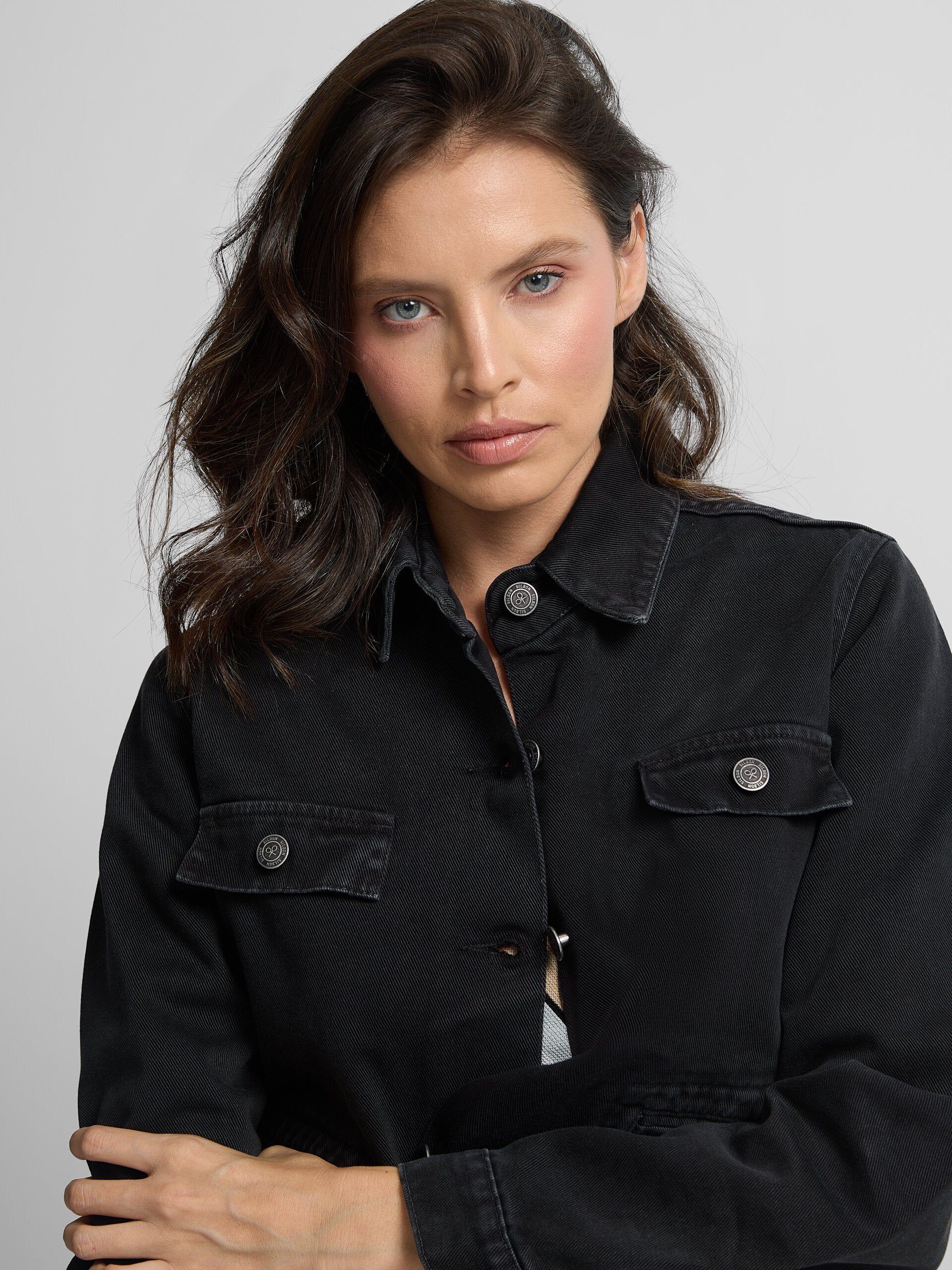 Black button denim jacket