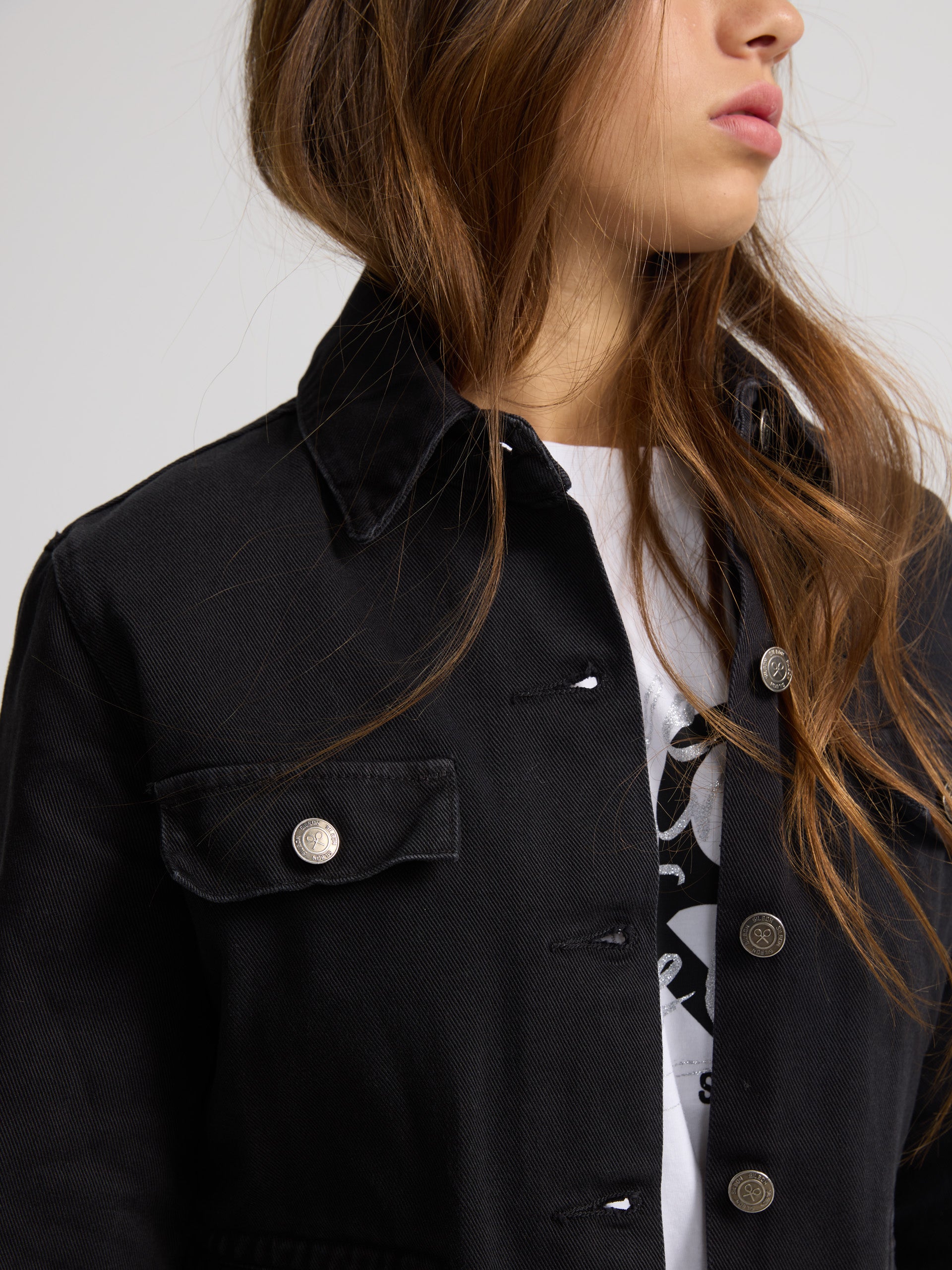 Black button denim jacket