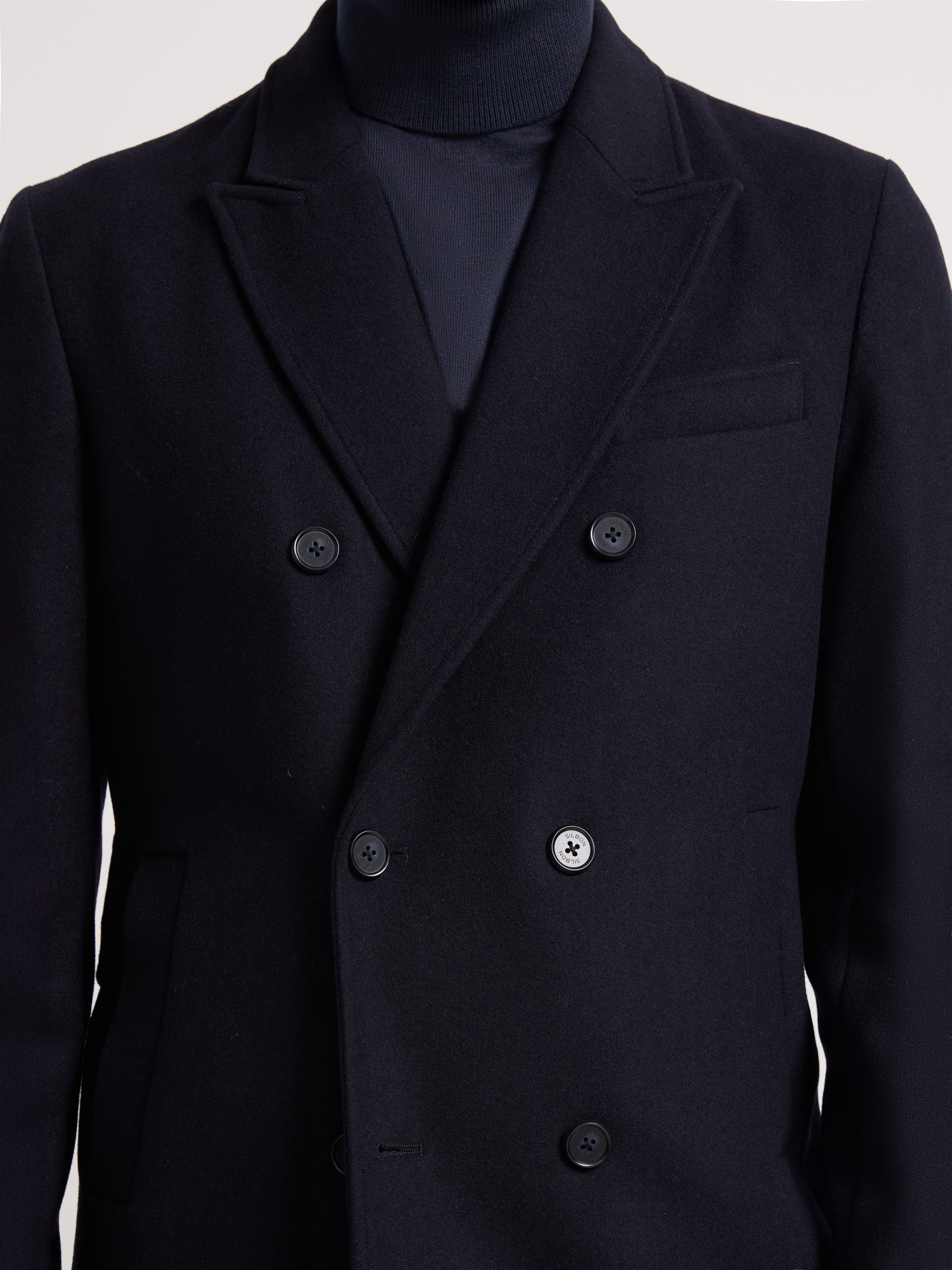 Navy blue double-breasted coat