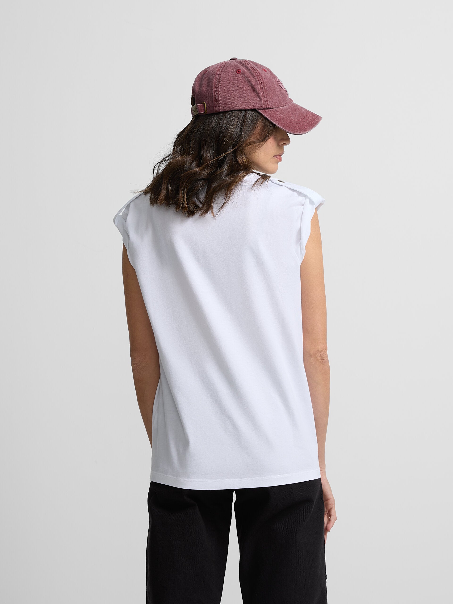 Women's roll out sleeve t-shirt with white appliqués