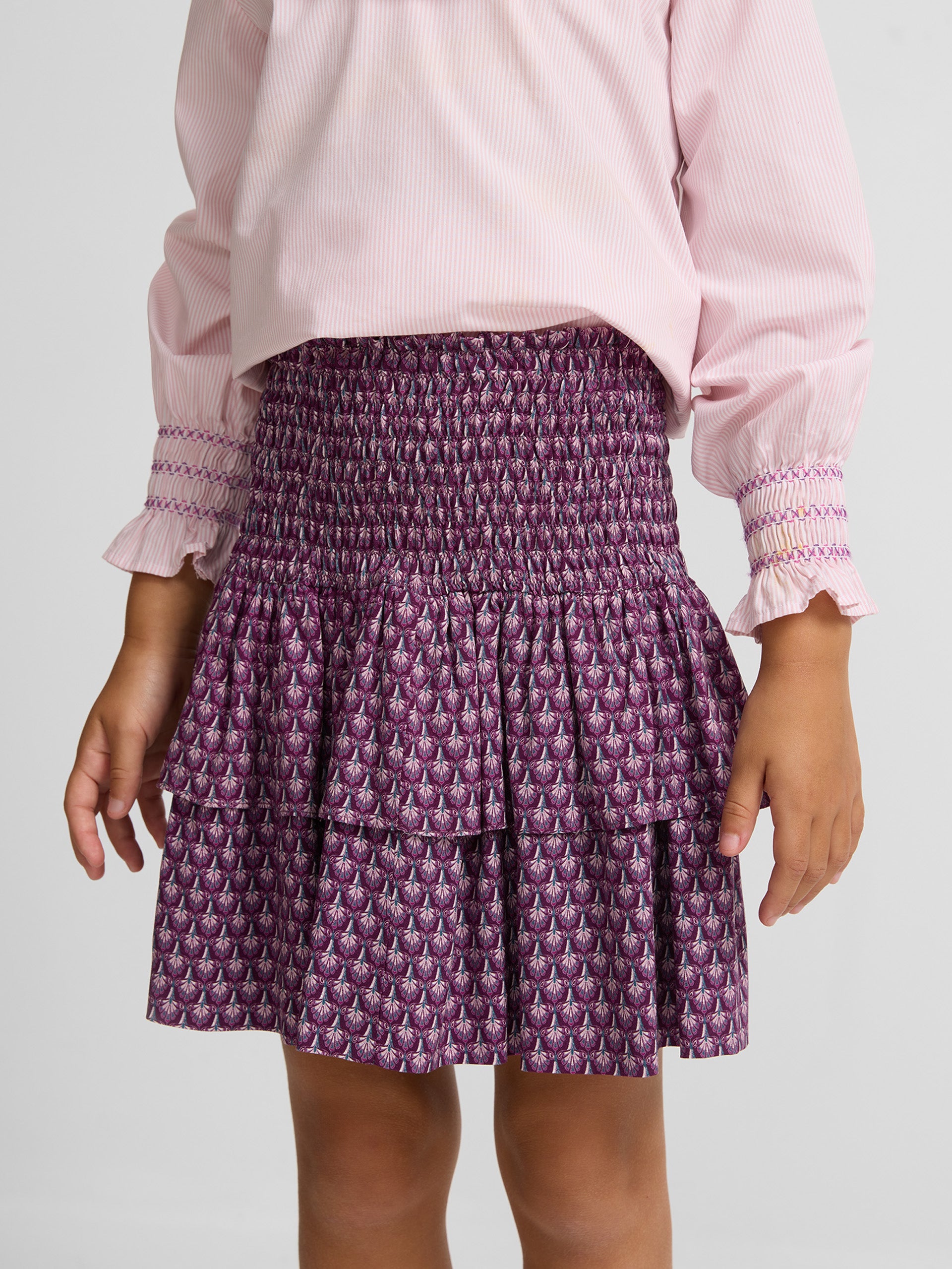 Mini girl skirt with purple flower ruffles