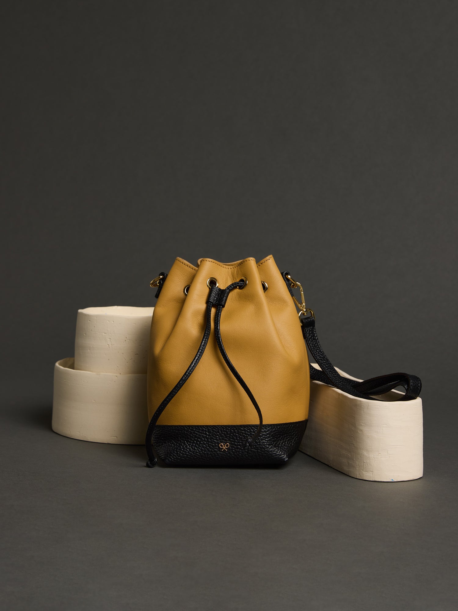 Camel and black combined leather sack bag