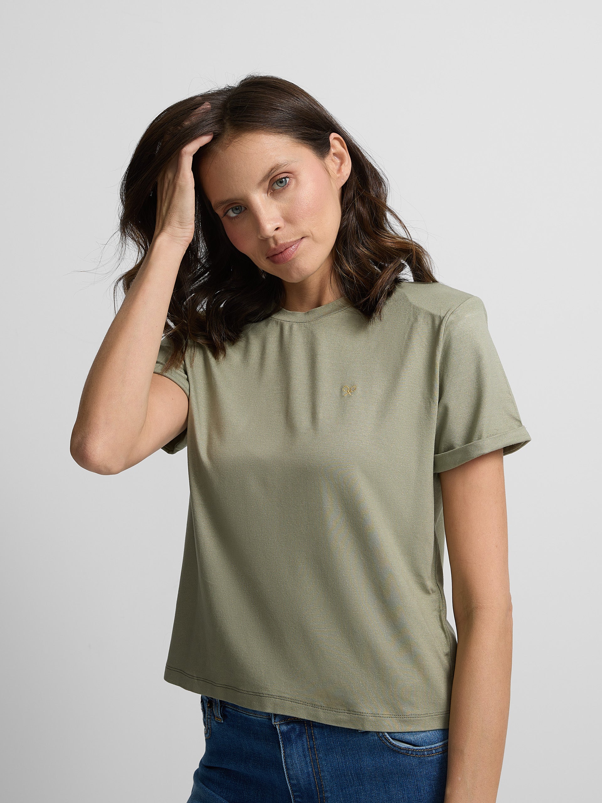 Woman lurex t-shirt with green shoulder pads