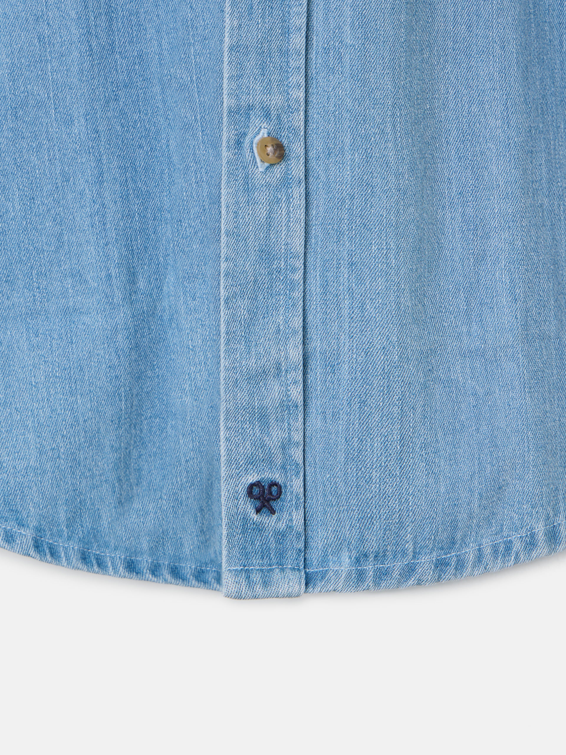 Denim shirt with medium blue pockets