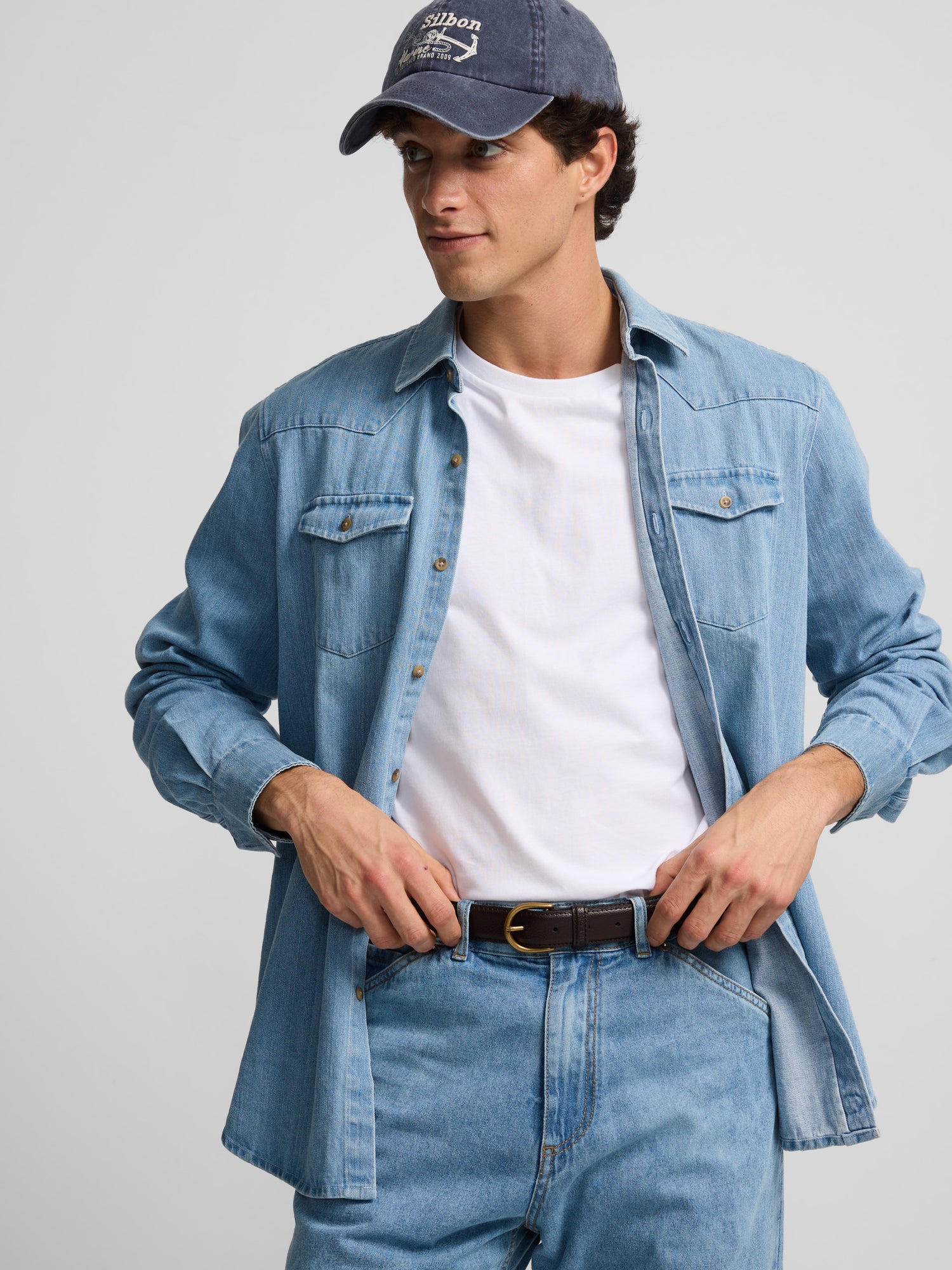 Denim shirt with medium blue pockets