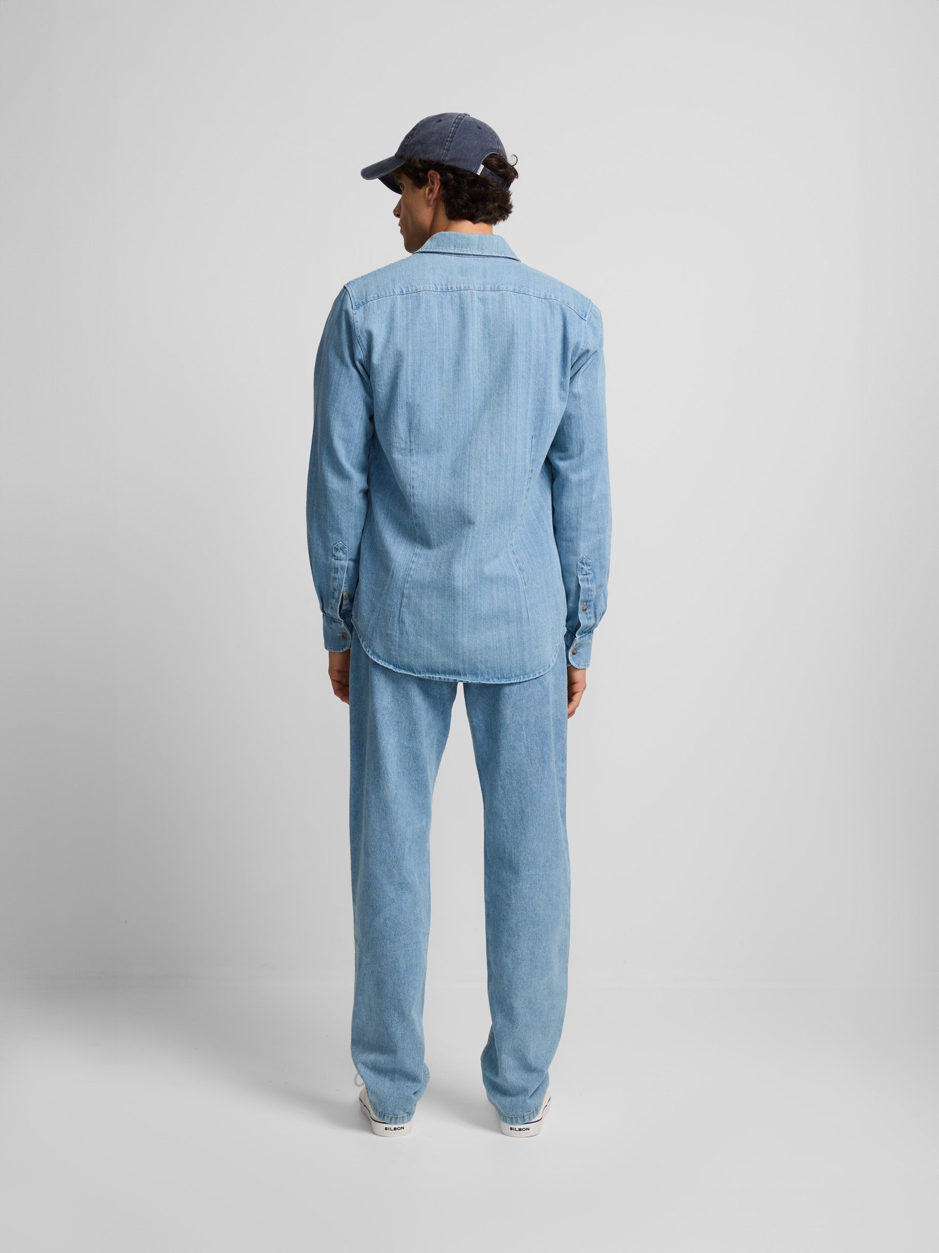 Denim shirt with medium blue pockets