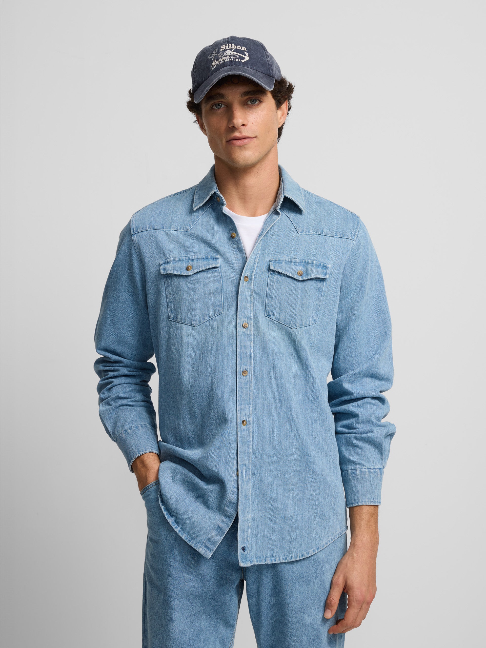 Denim shirt with medium blue pockets