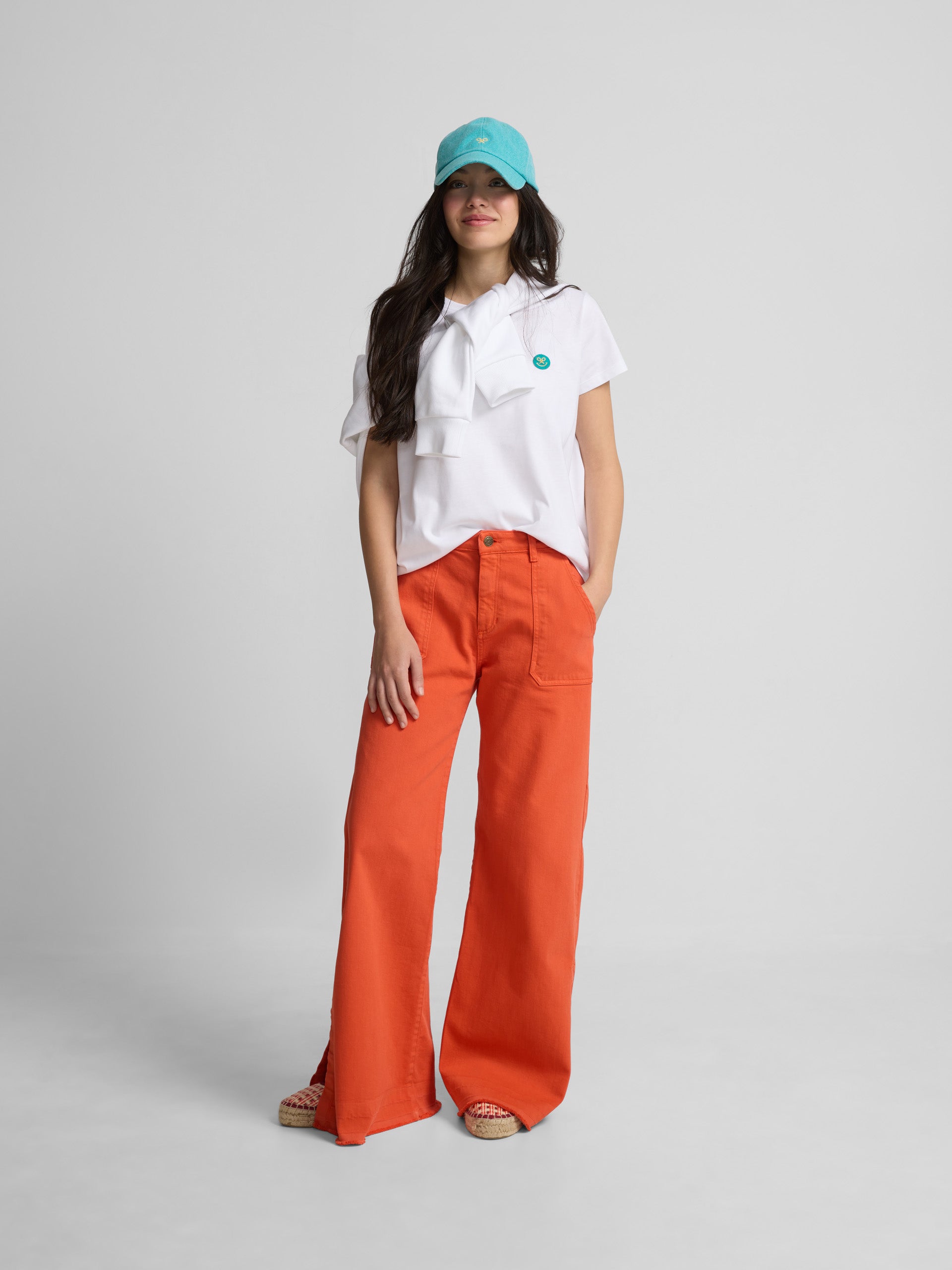 Denim culotte pants with orange pockets