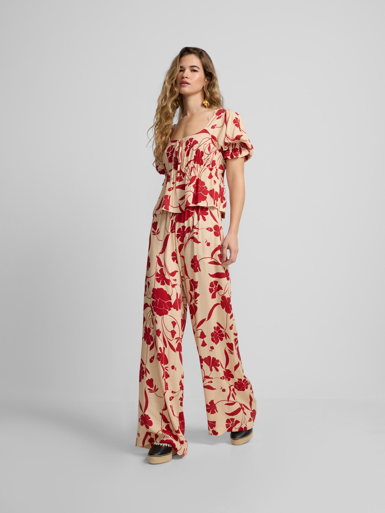 Palazzo pants with red flower print