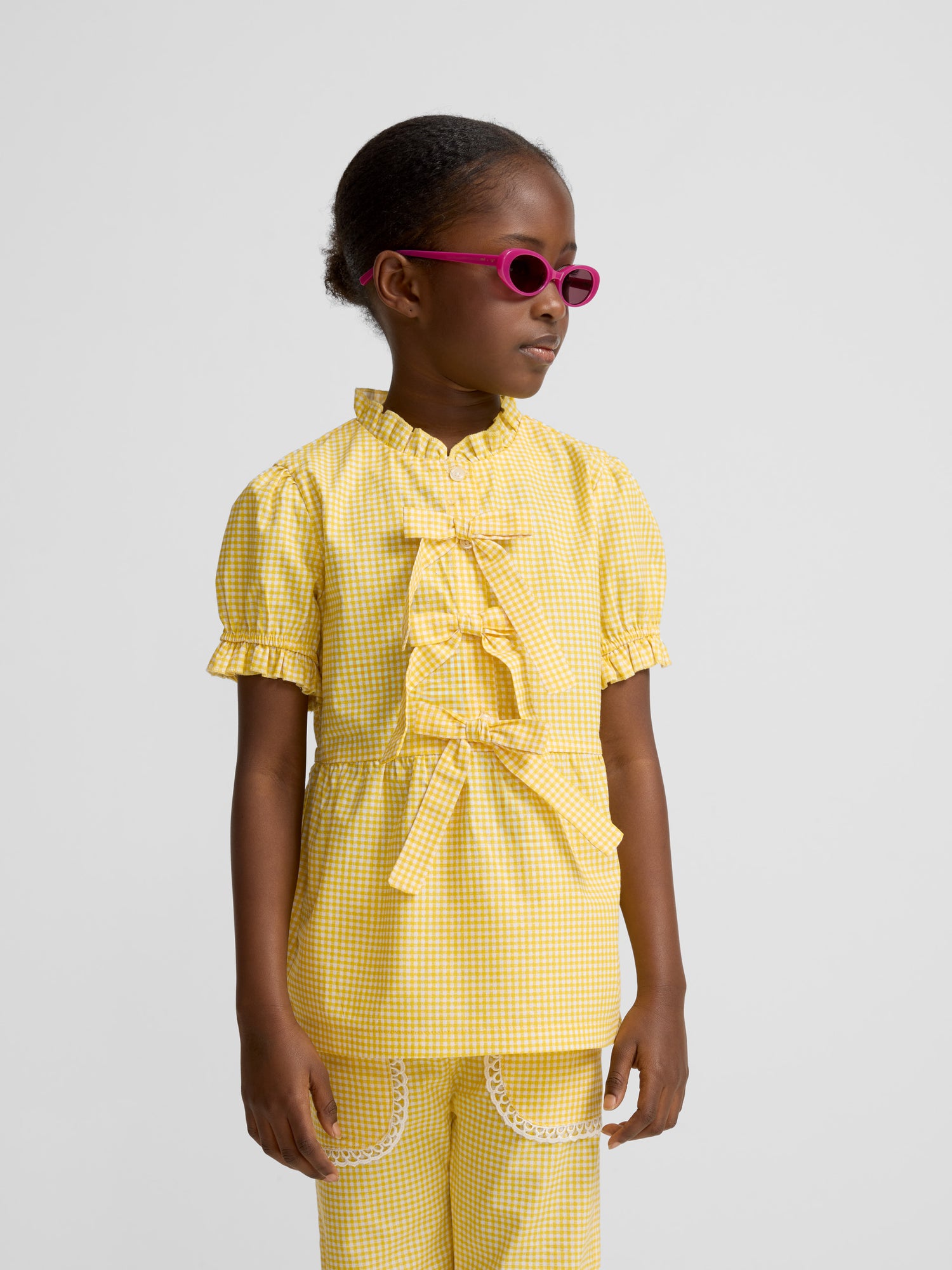 Girl blouse with yellow gingham bow