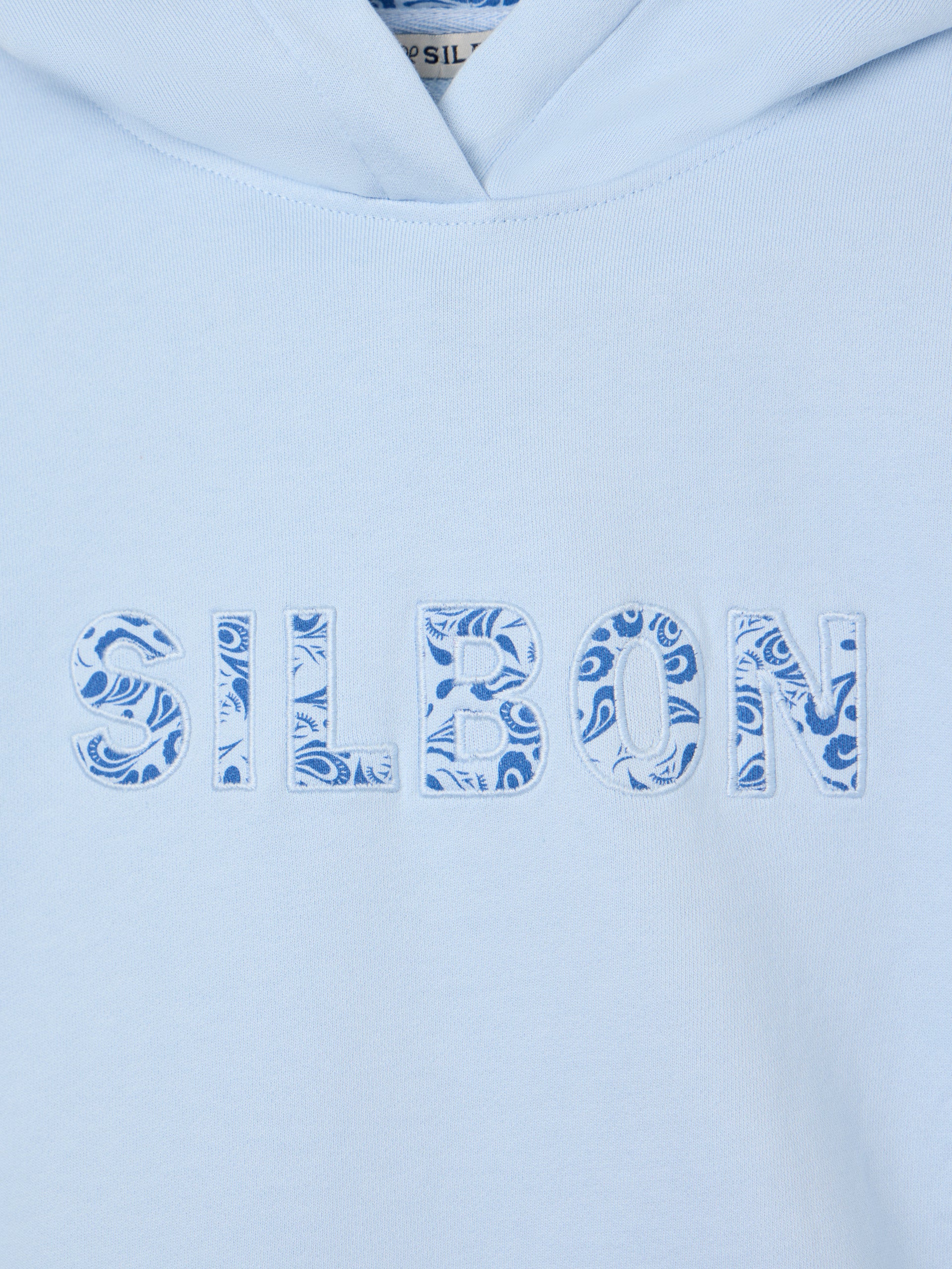 Sudadera woman aplique silbon estampado celeste