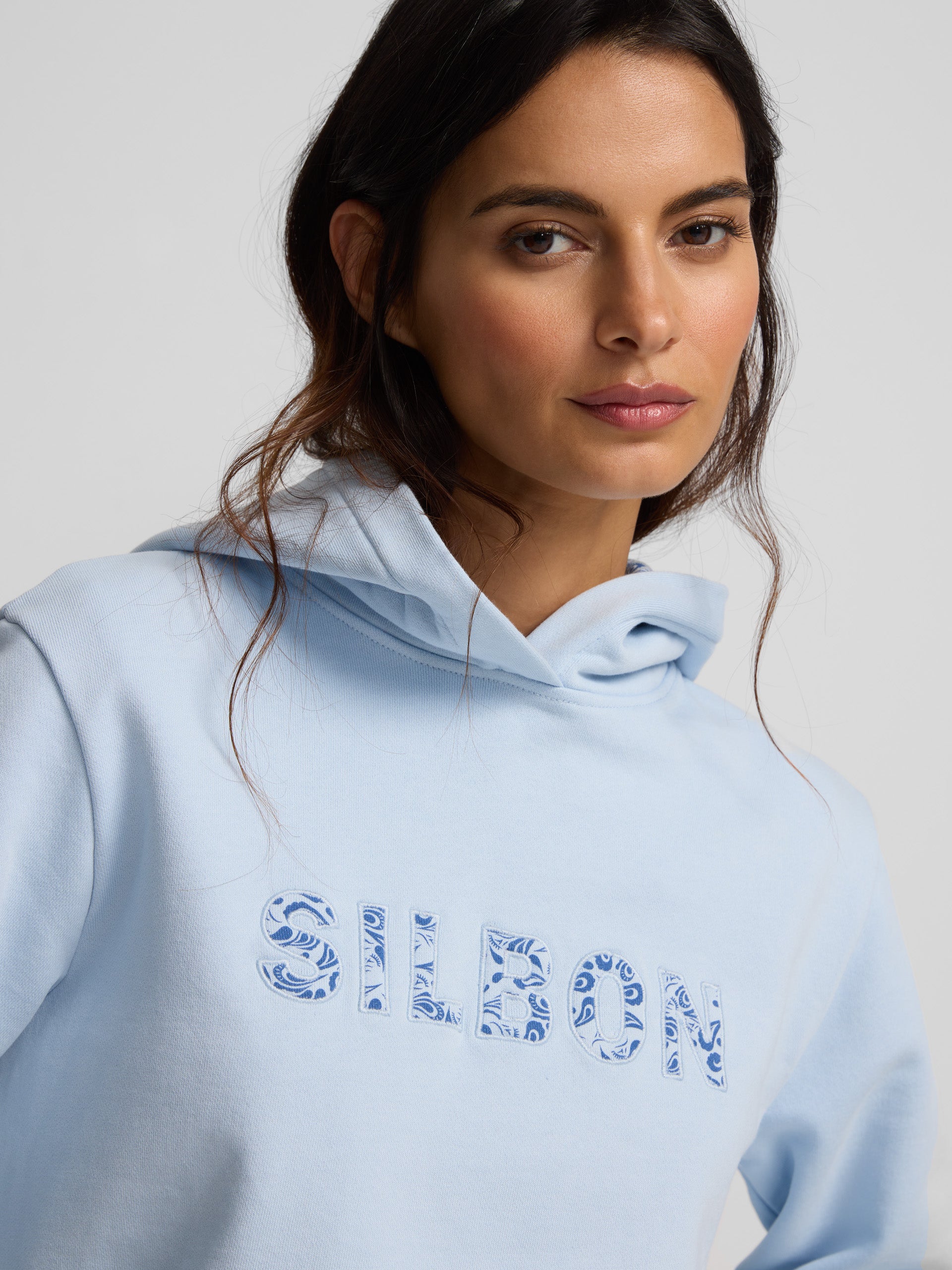 Sudadera woman aplique silbon estampado celeste