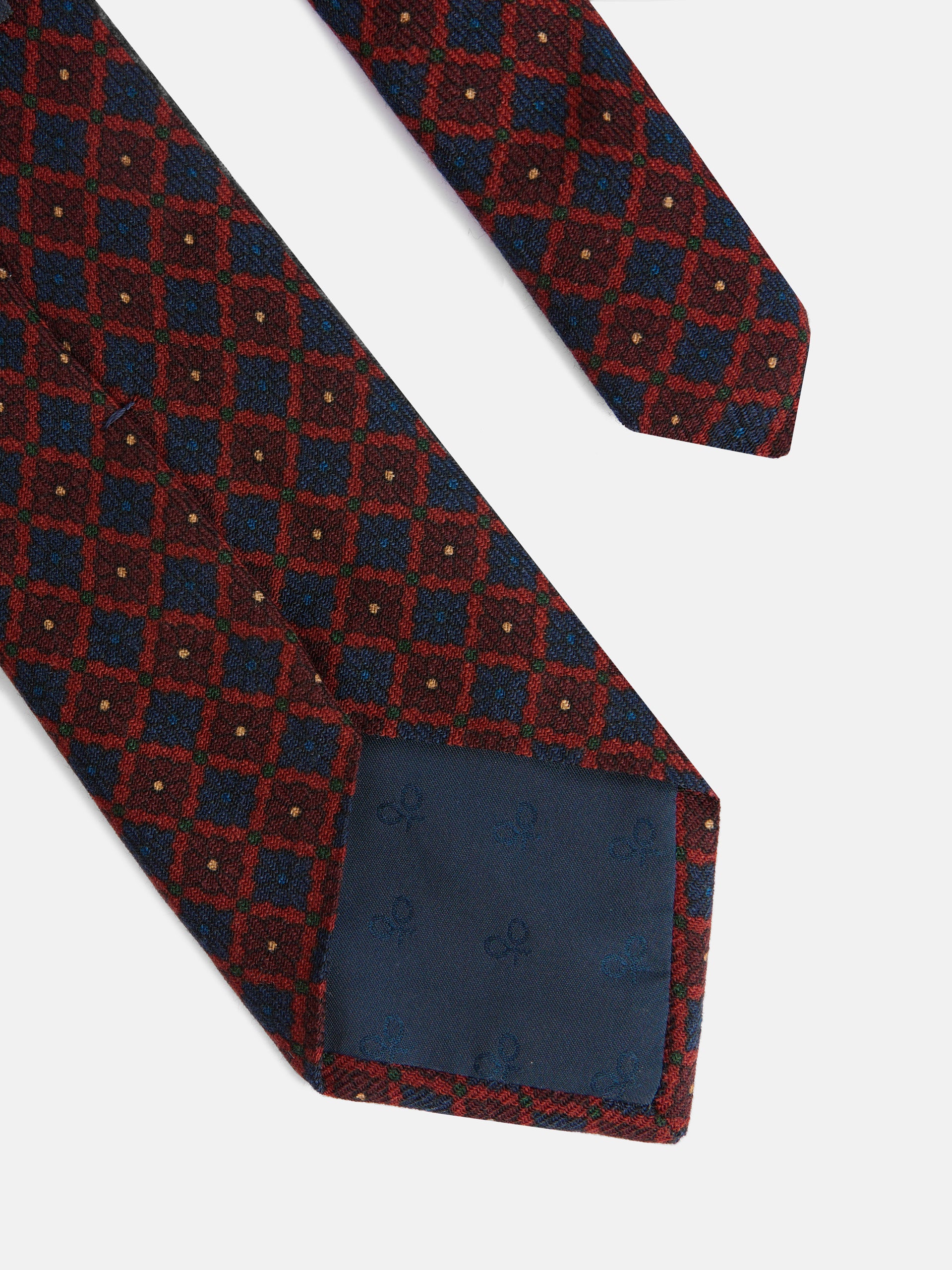 Corbata geometrica floral azul marino