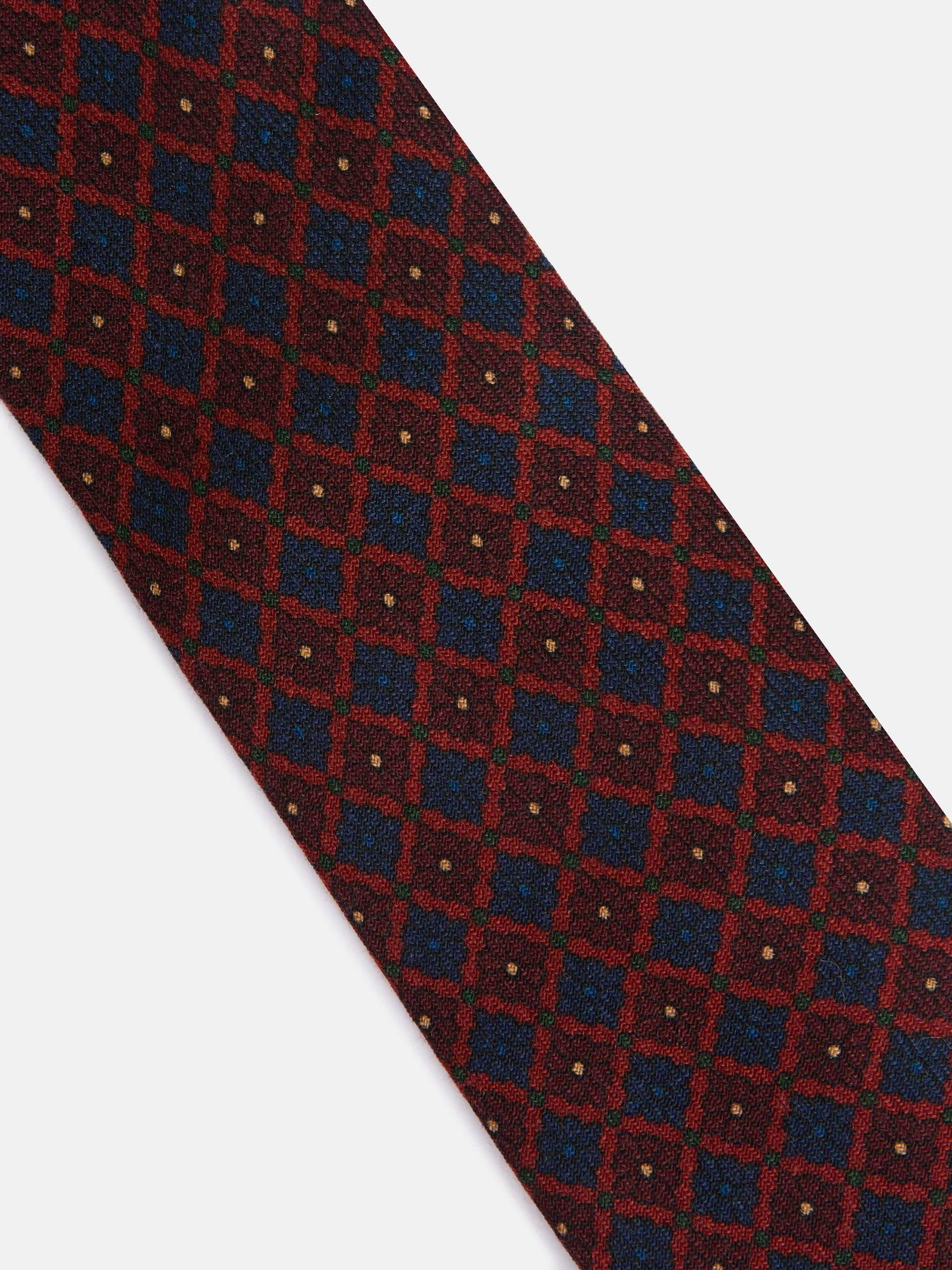 Corbata geometrica floral azul marino