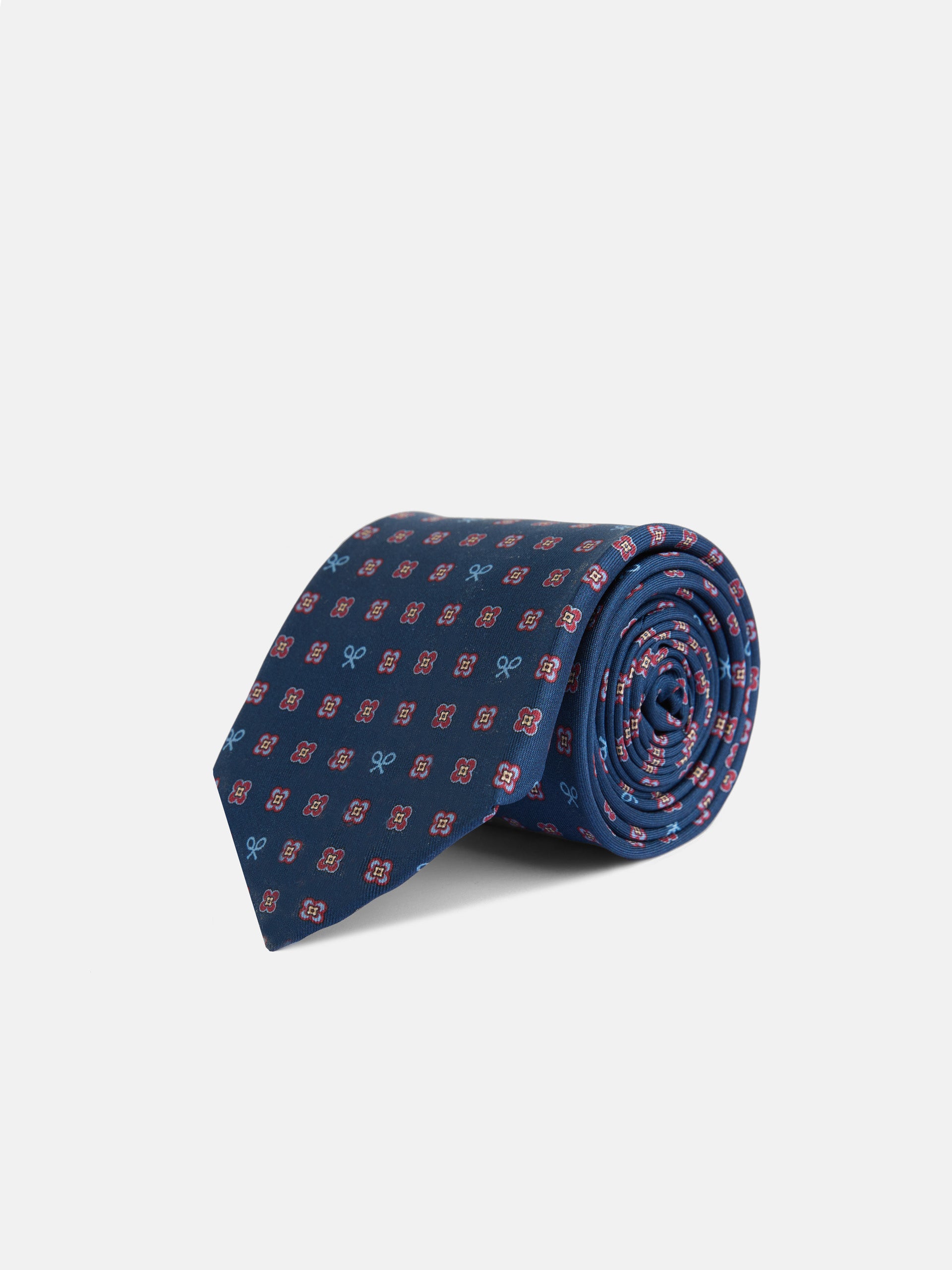 Corbata raquetas motivos geometricos pequeños azul marino