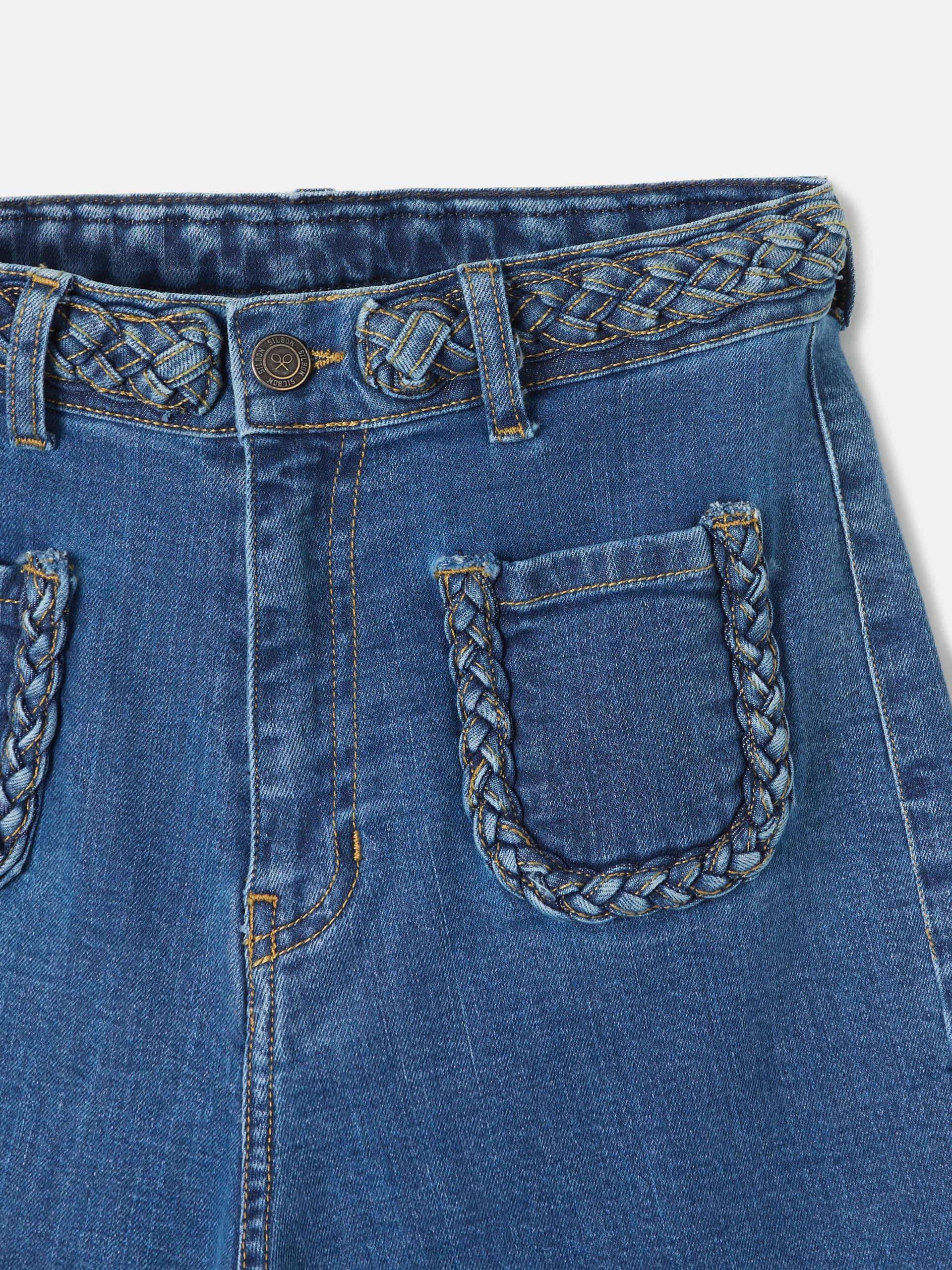 Pantalon flare detalle trenzas denim